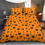 The Black Cat With Yellow Eyes And The Fish Skull On The Orange Bedding Set